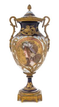 A Sevres Style Gilt Bronze Mounted Porcelain Urn Height 17 inches.