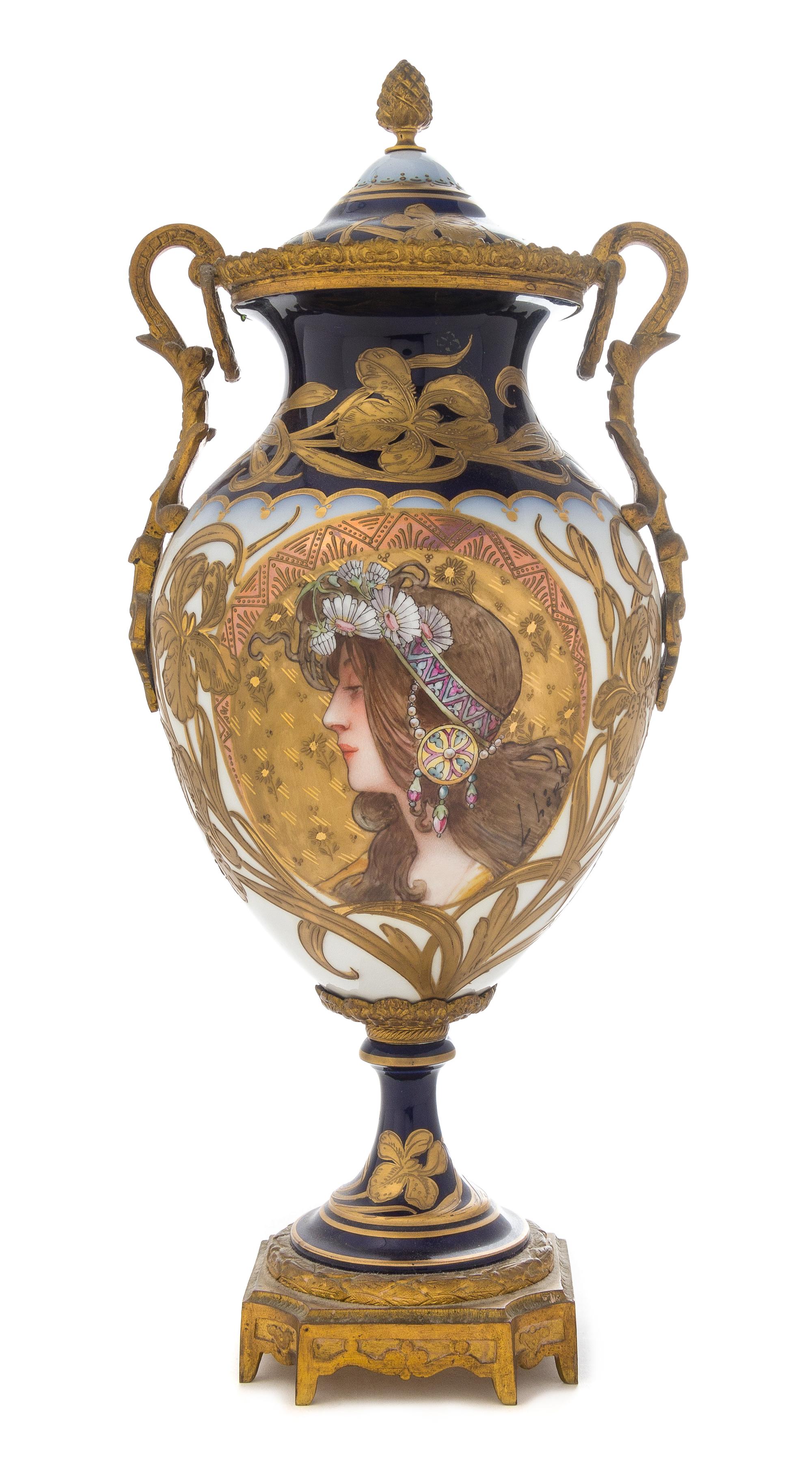 A Sevres Style Gilt Bronze Mounted Porcelain Urn Height 17 inches.