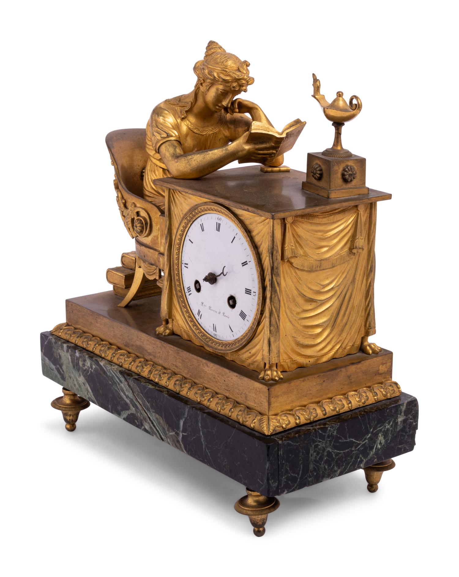 An Empire Gilt Bronze and Marble Figural Mantel Clock