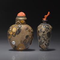 Two Chinese Puddingstone Snuff Bottles, Qing Dynasty, Circa 1750-1860 — 1750-1860年 抱子石鼻煙壺兩支