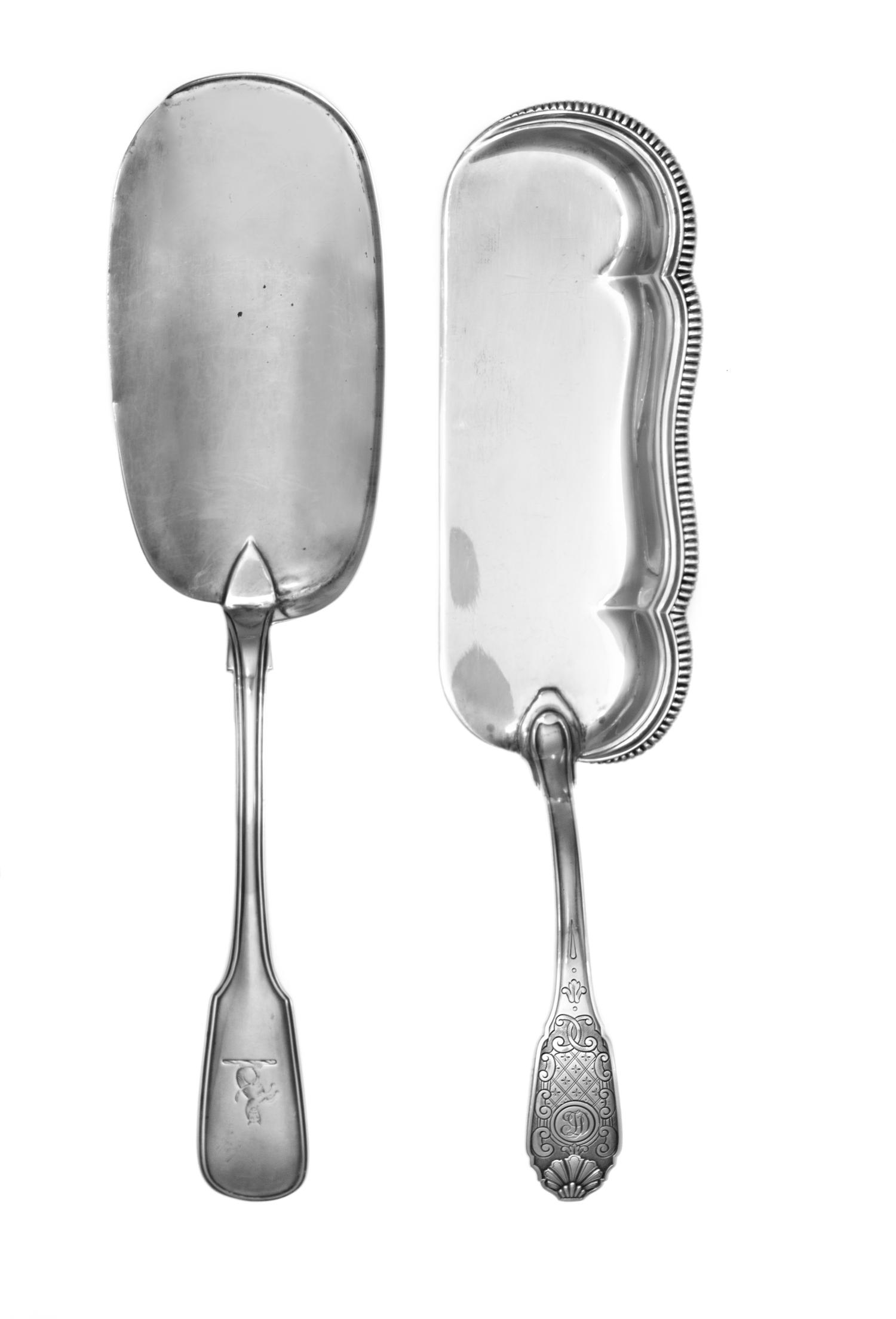 A Victorian Silver Crumber, Samuel Hayne, London, 1864, having a fiddle form handle and an engraved crest, together with a French silve