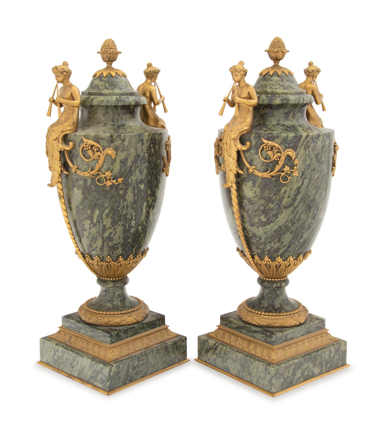 A Pair of French Gilt Bronze Mounted Marble Urns