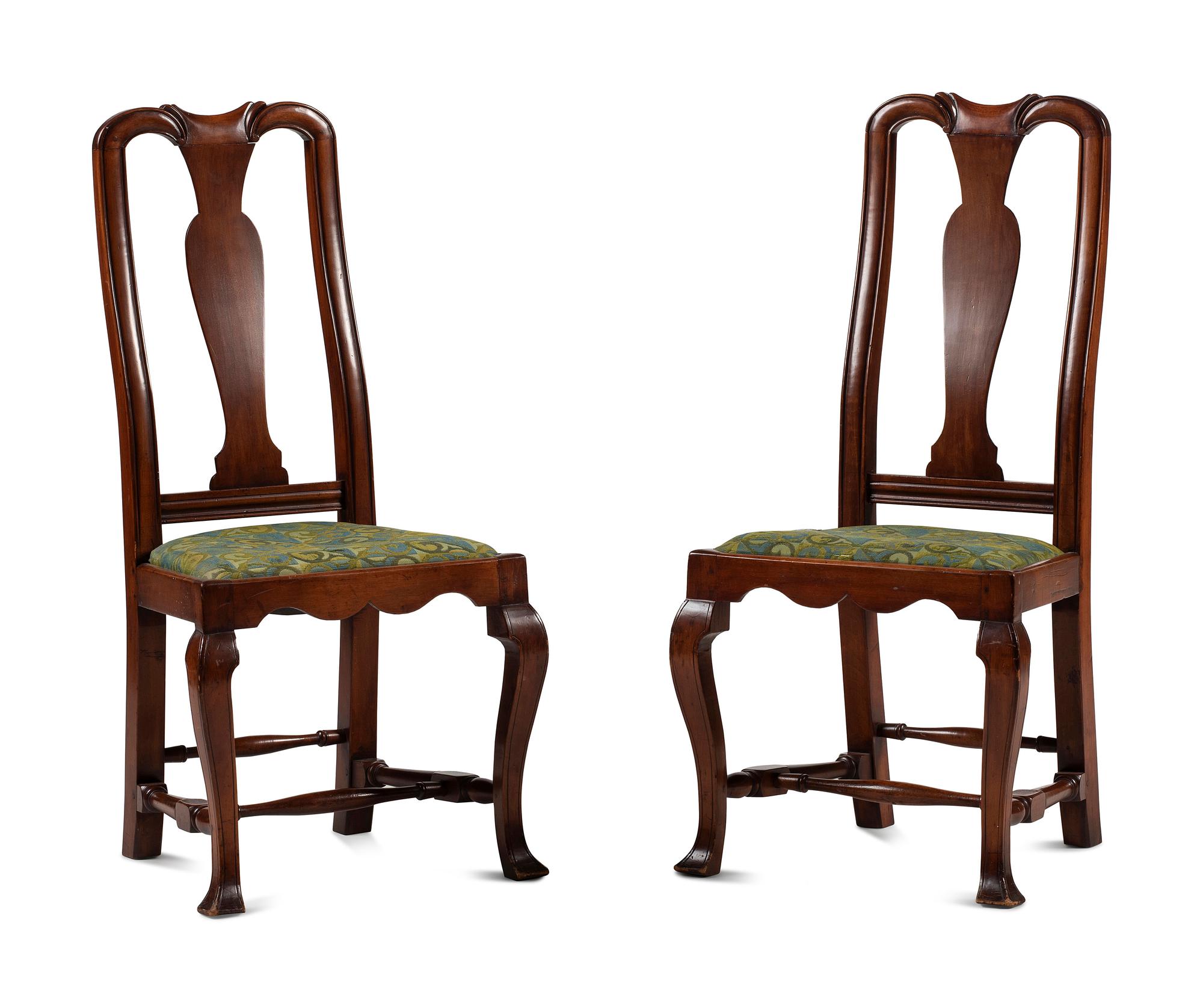 A Pair of William and Mary Style Carved and Stained Maple Side Chairs