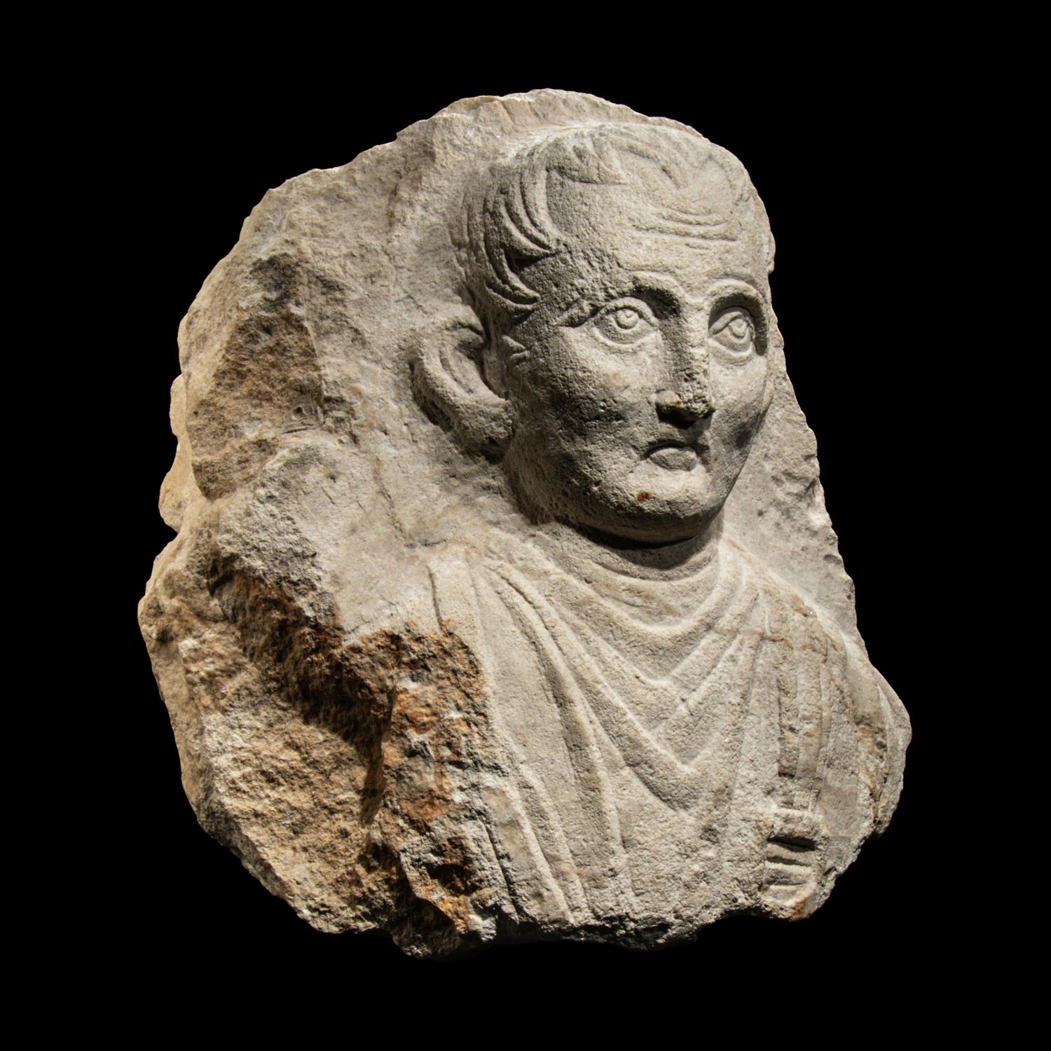 A Palmyrene Limestone Bust of a Man