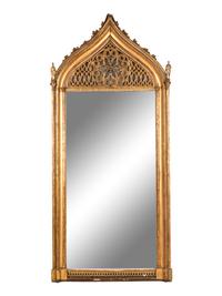 A Continental Gothic Revival Carved Giltwood Mirror