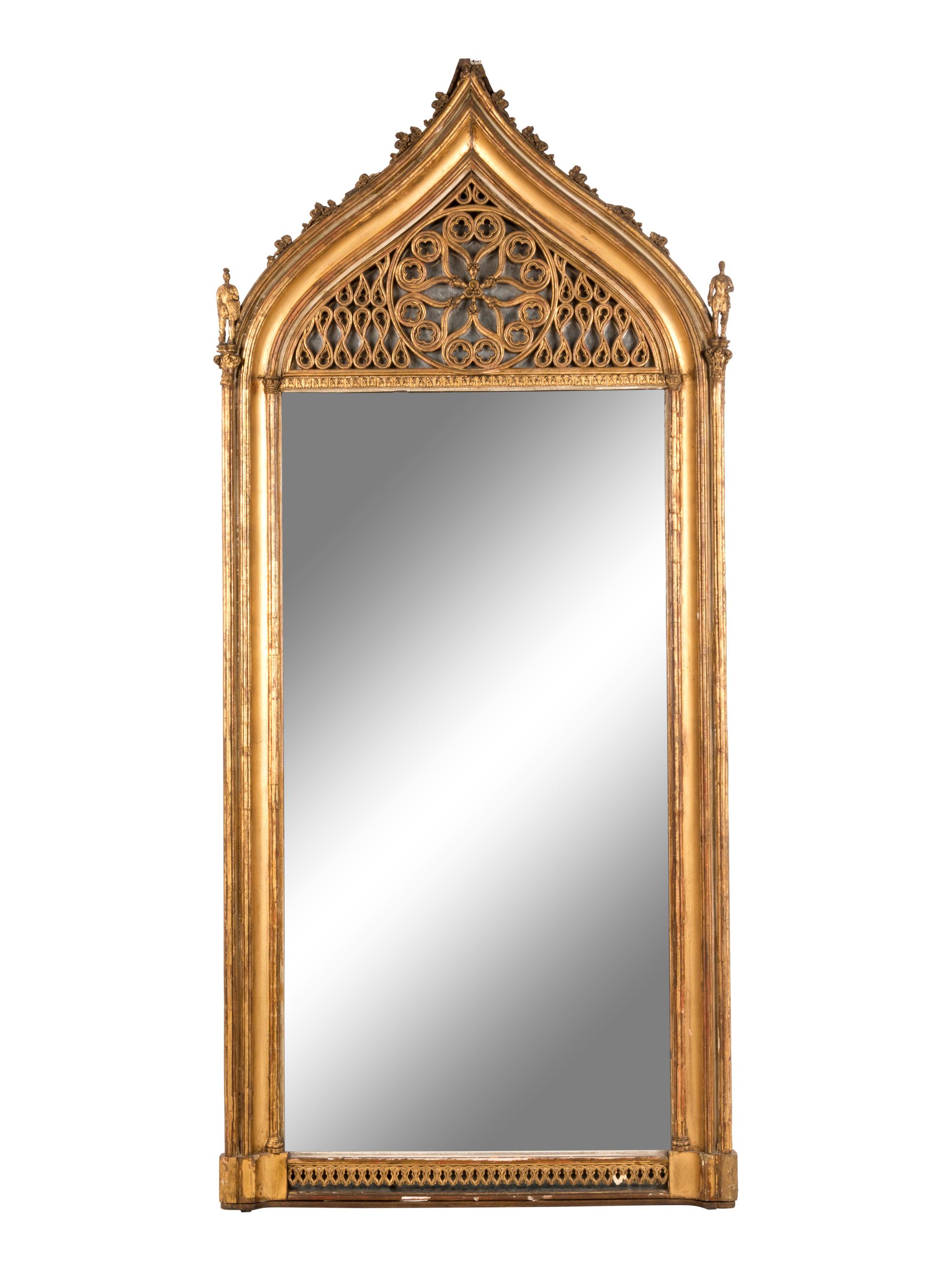 A Continental Gothic Revival Carved Giltwood Mirror