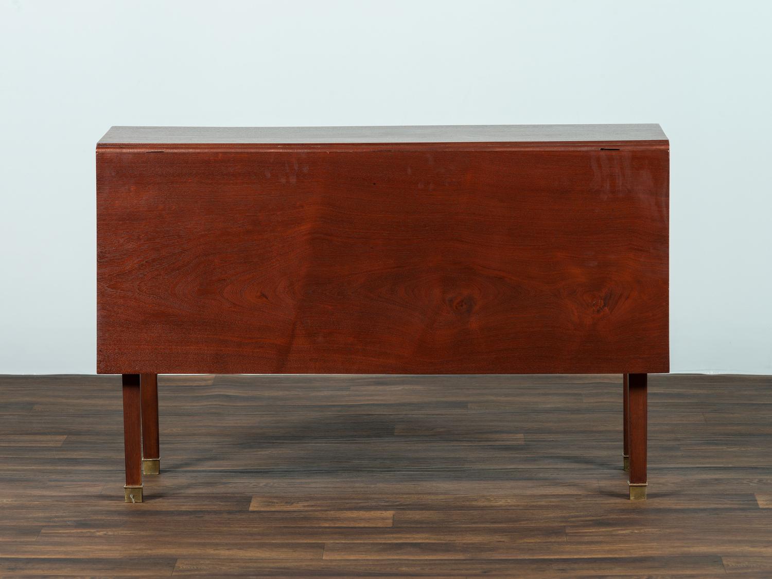 A George III Mahogany Drop-Leaf Dining Table