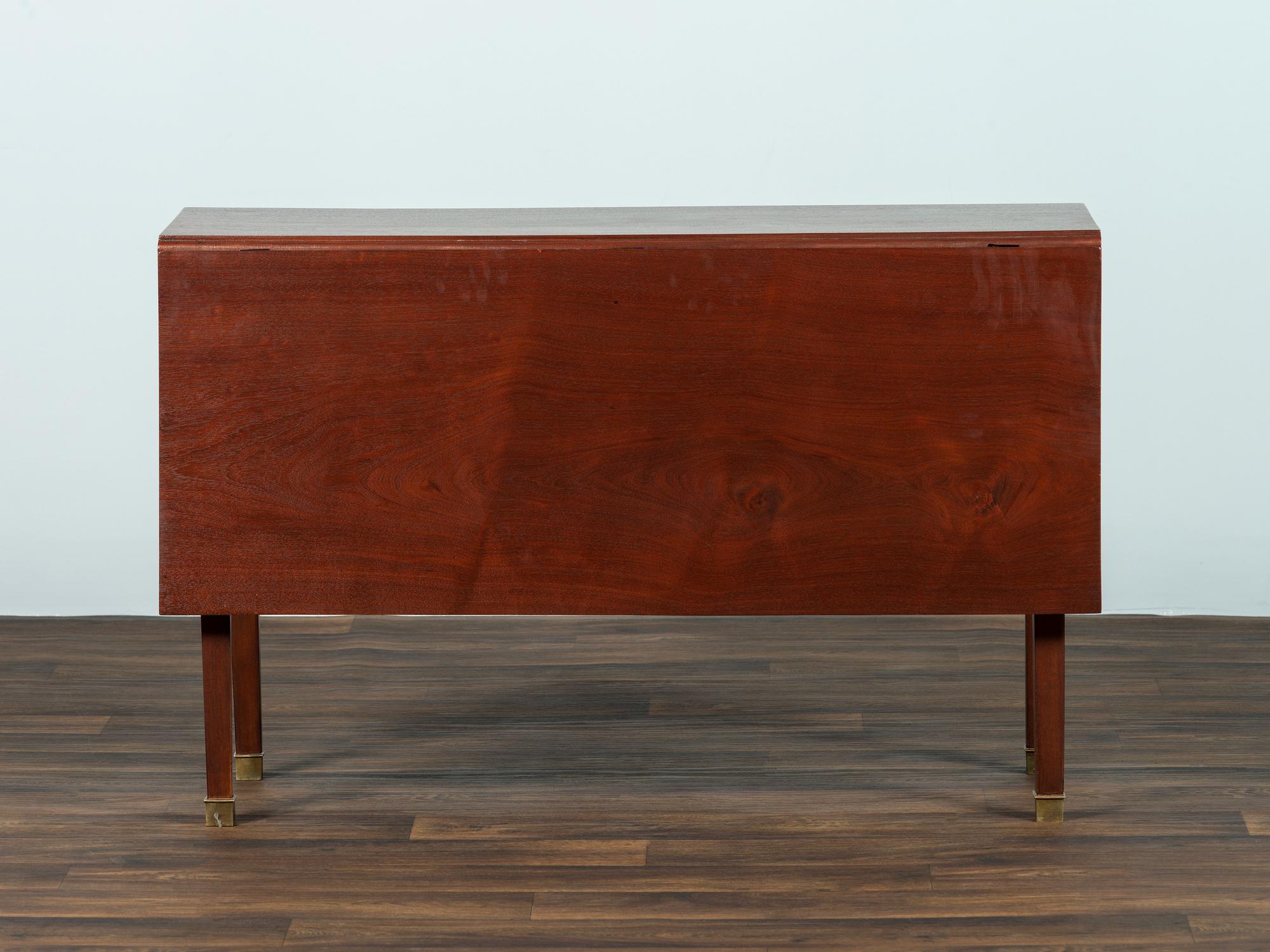 A George III Mahogany Drop-Leaf Dining Table