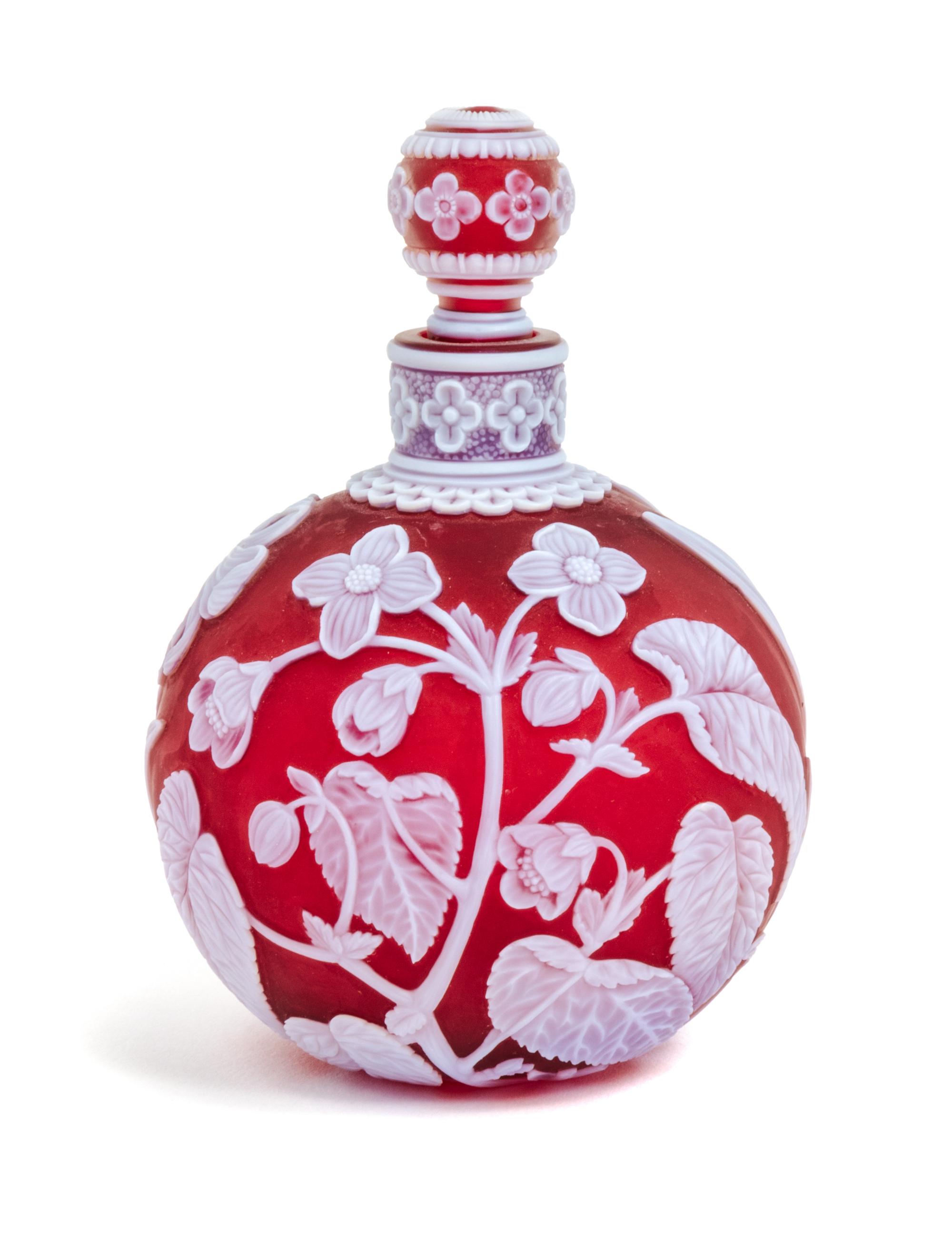 English, LATE 19TH CENTURY, a cameo glass perfume bottle, the bottle and stopper each of spherical form will allover foliate decoration