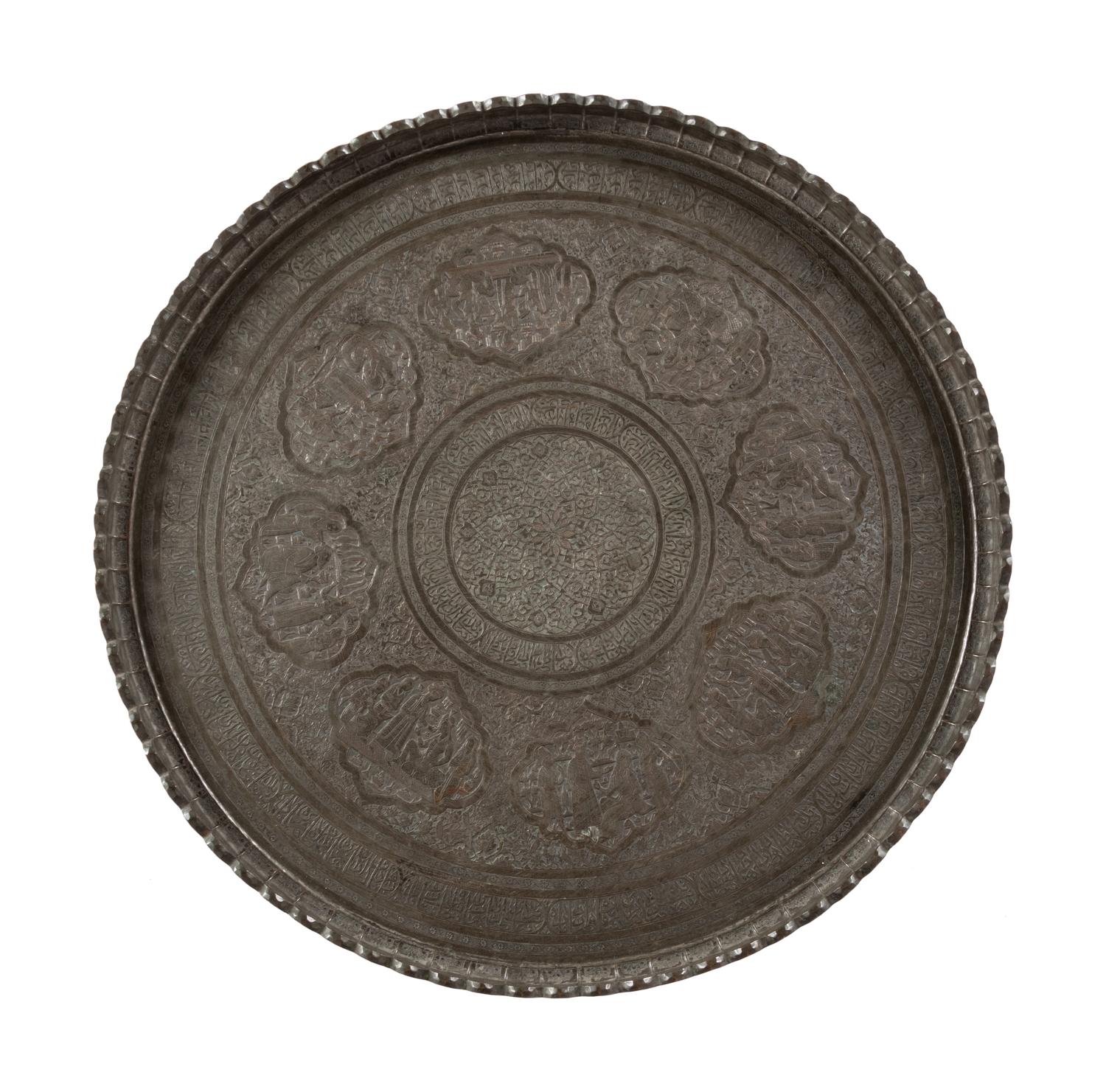 A Large Islamic Pressed Brass Tray on a Later Stand