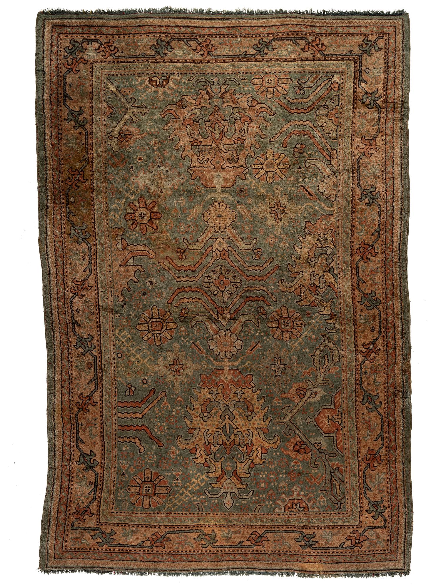 An Oushak Wool Rug
