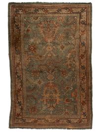An Oushak Wool Rug