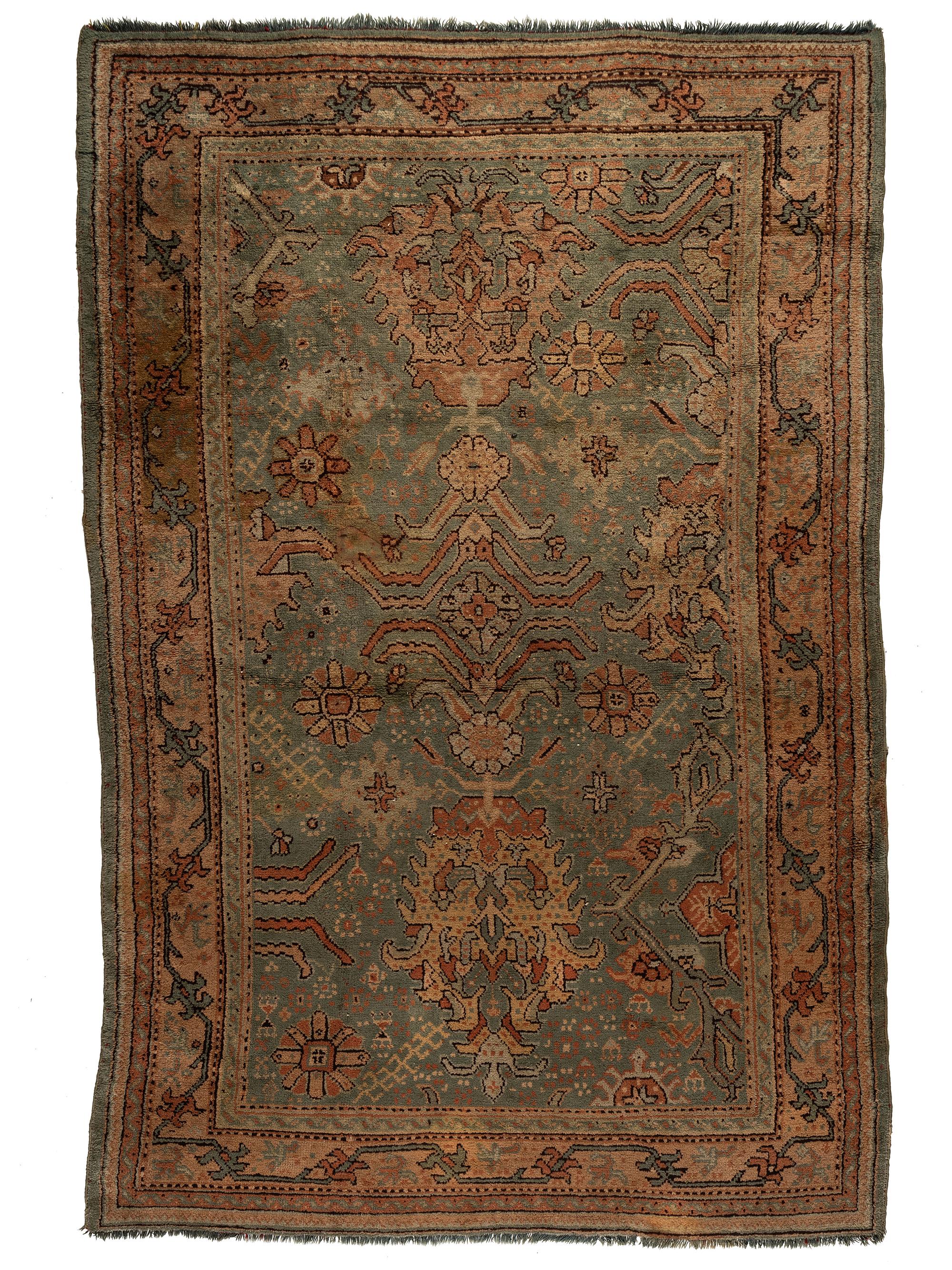 An Oushak Wool Rug
