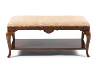 A Queen Anne Style Upholstered Two-Tier Coffee Table