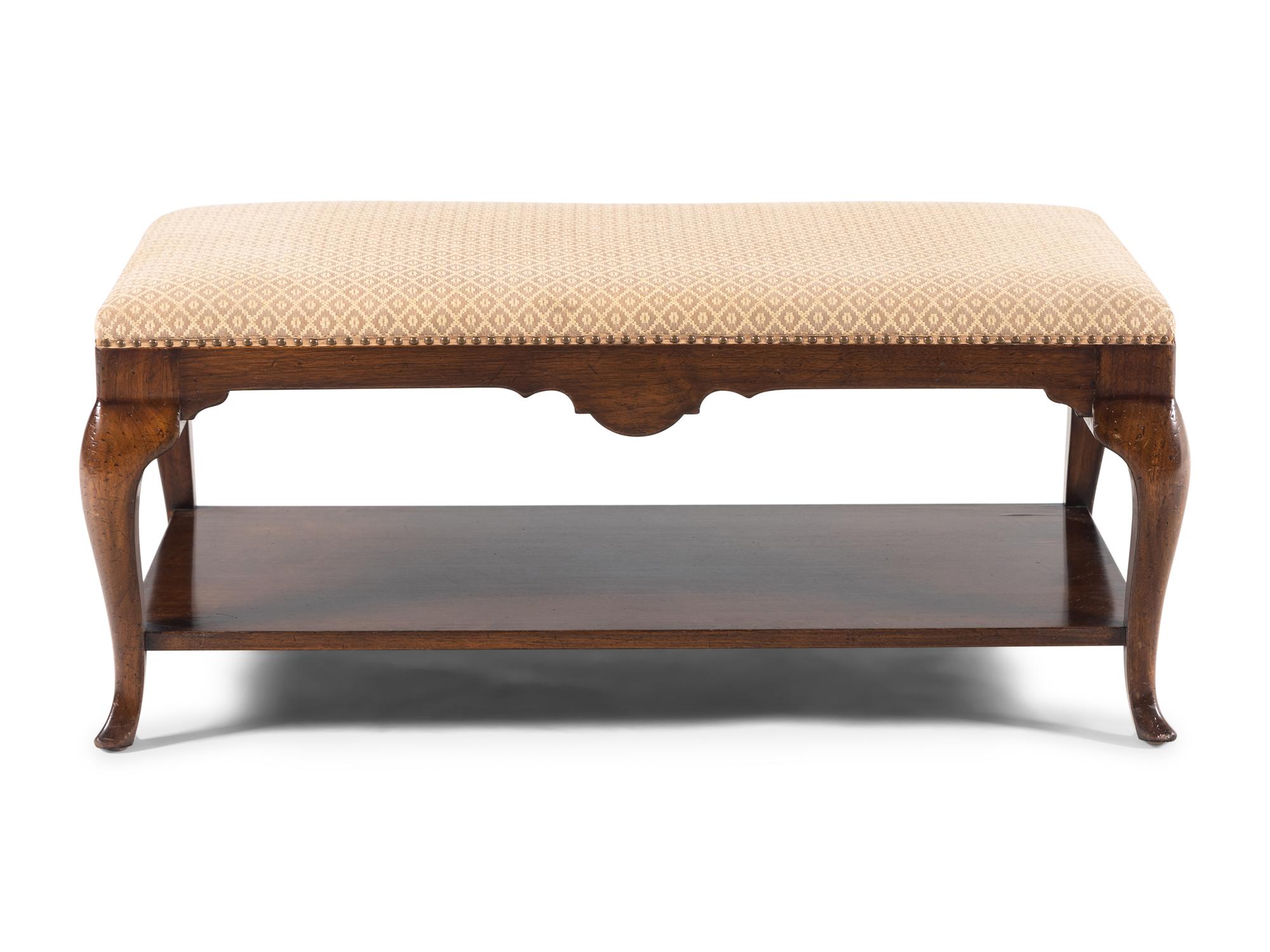 A Queen Anne Style Upholstered Two-Tier Coffee Table