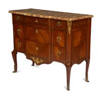 A French Gilt Metal Mounted Mahogany and Kingwood Marquetry Marble-Top Commode