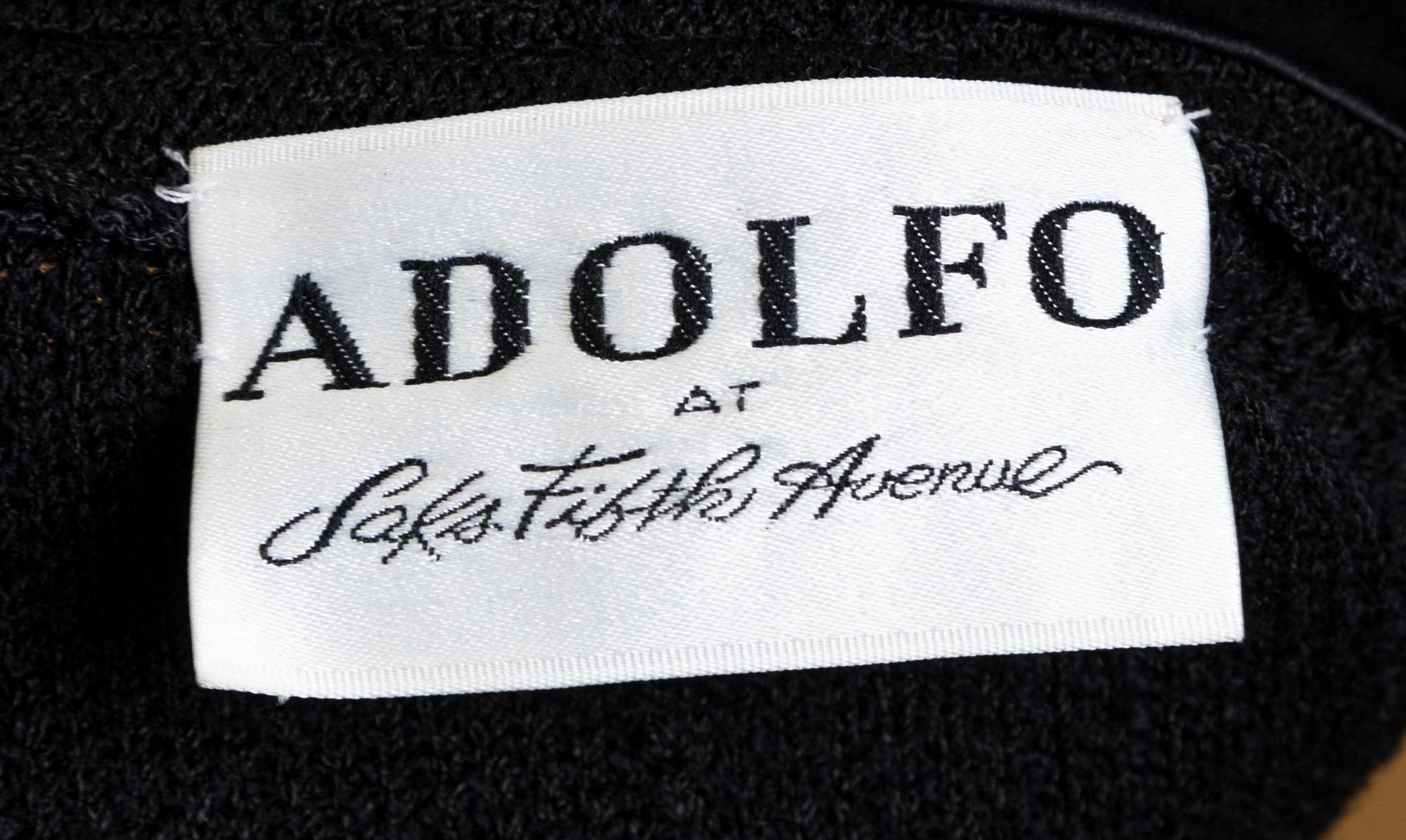 An Adolfo Black Knit Skirt Ensemble, No size. Handbag: 8'' x 6.5''; Strap drop: 10''.