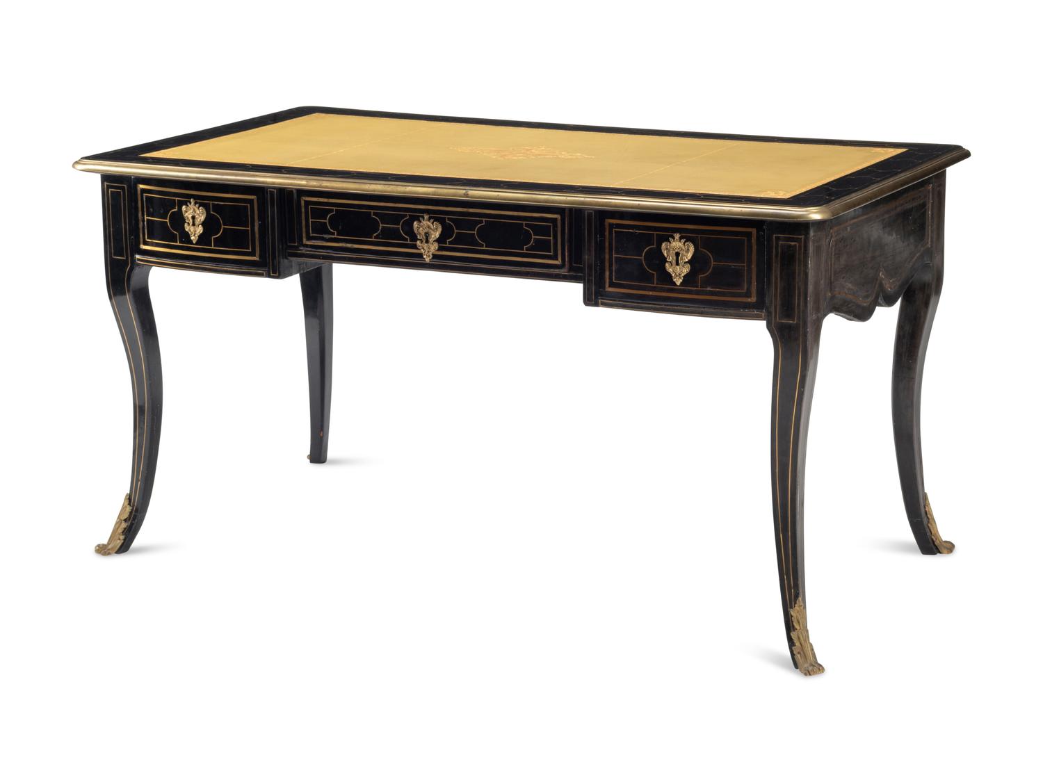A Louis XIV Brass-Inlaid and Gilt Bronze Mounted Ebony Bureau Plat