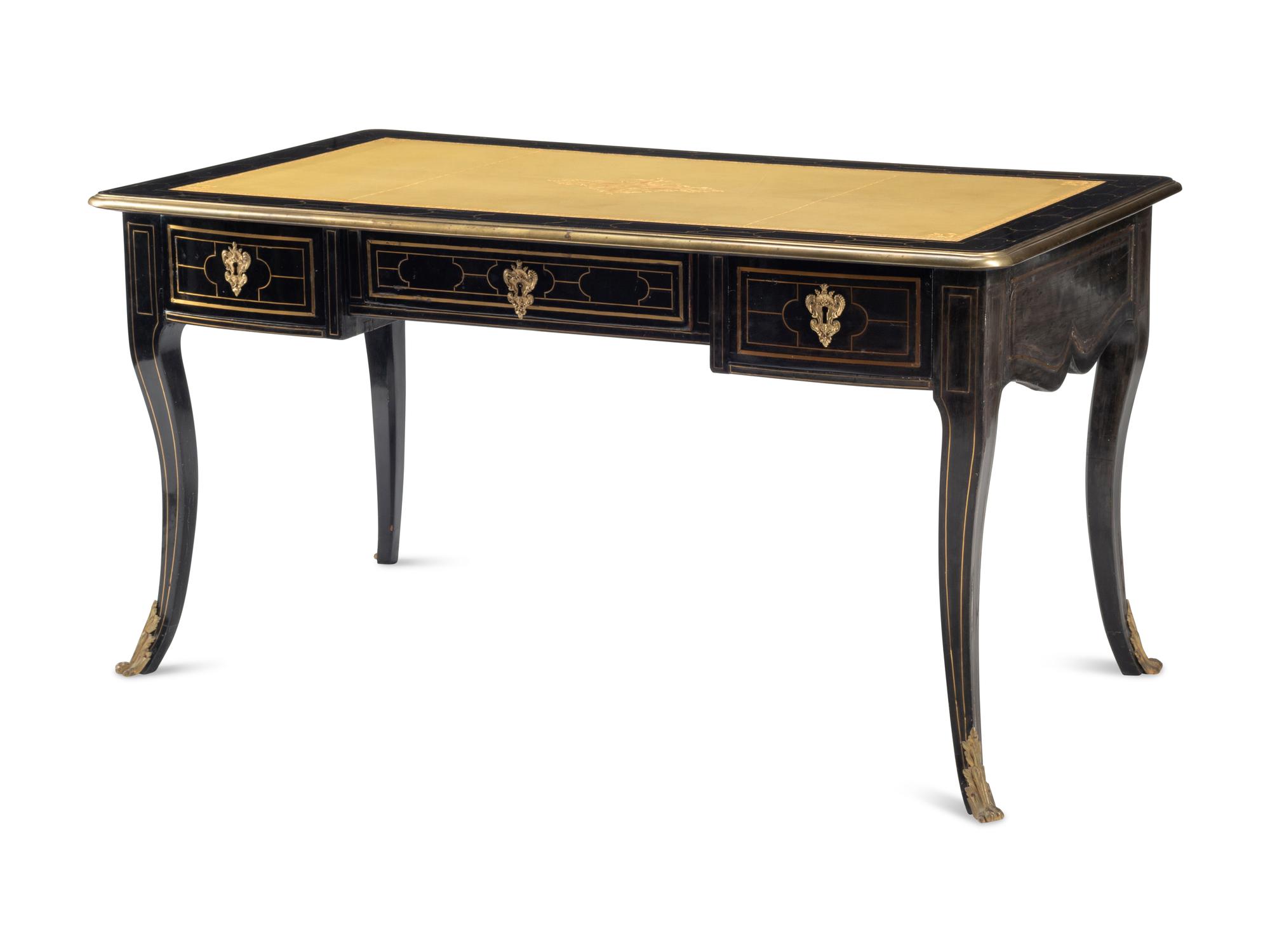 A Louis XIV Brass-Inlaid and Gilt Bronze Mounted Ebony Bureau Plat