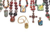 A Group of Thirteen Necklaces and Three Pendants