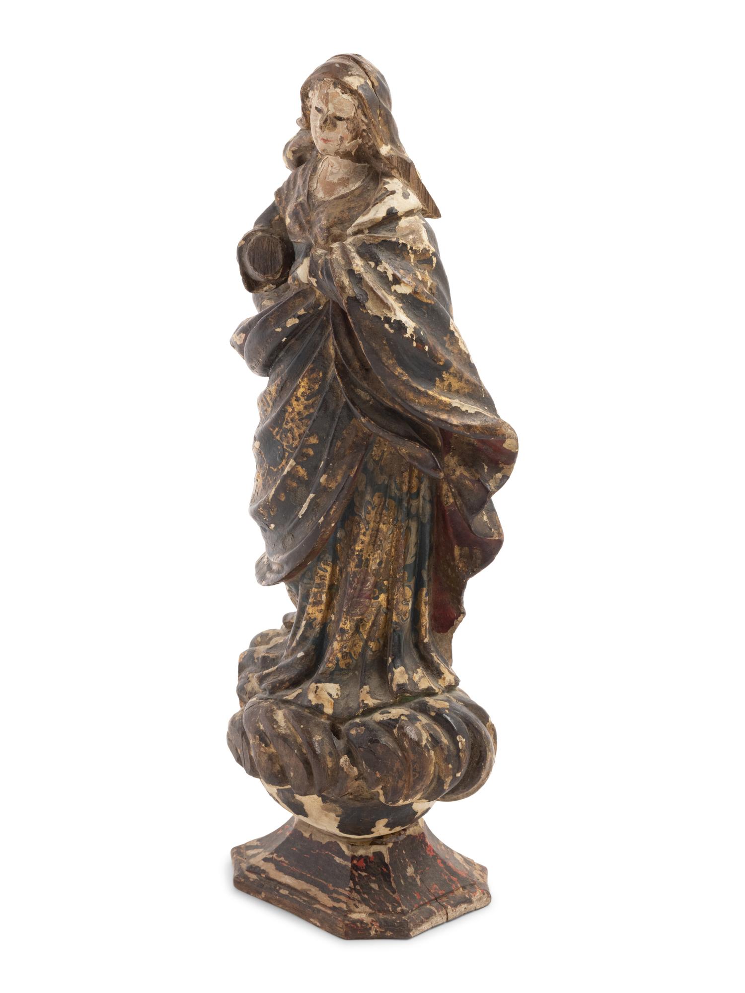 A Continental Painted and Parcel Gilt Carved Wood Figure of an Angel