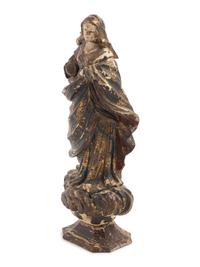 A Continental Painted and Parcel Gilt Carved Wood Figure of an Angel