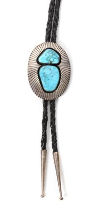 A Navajo Silver and Turquoise Bolo, Alvin Vandever Height 2 3/8 x width 1 3/4 inches.