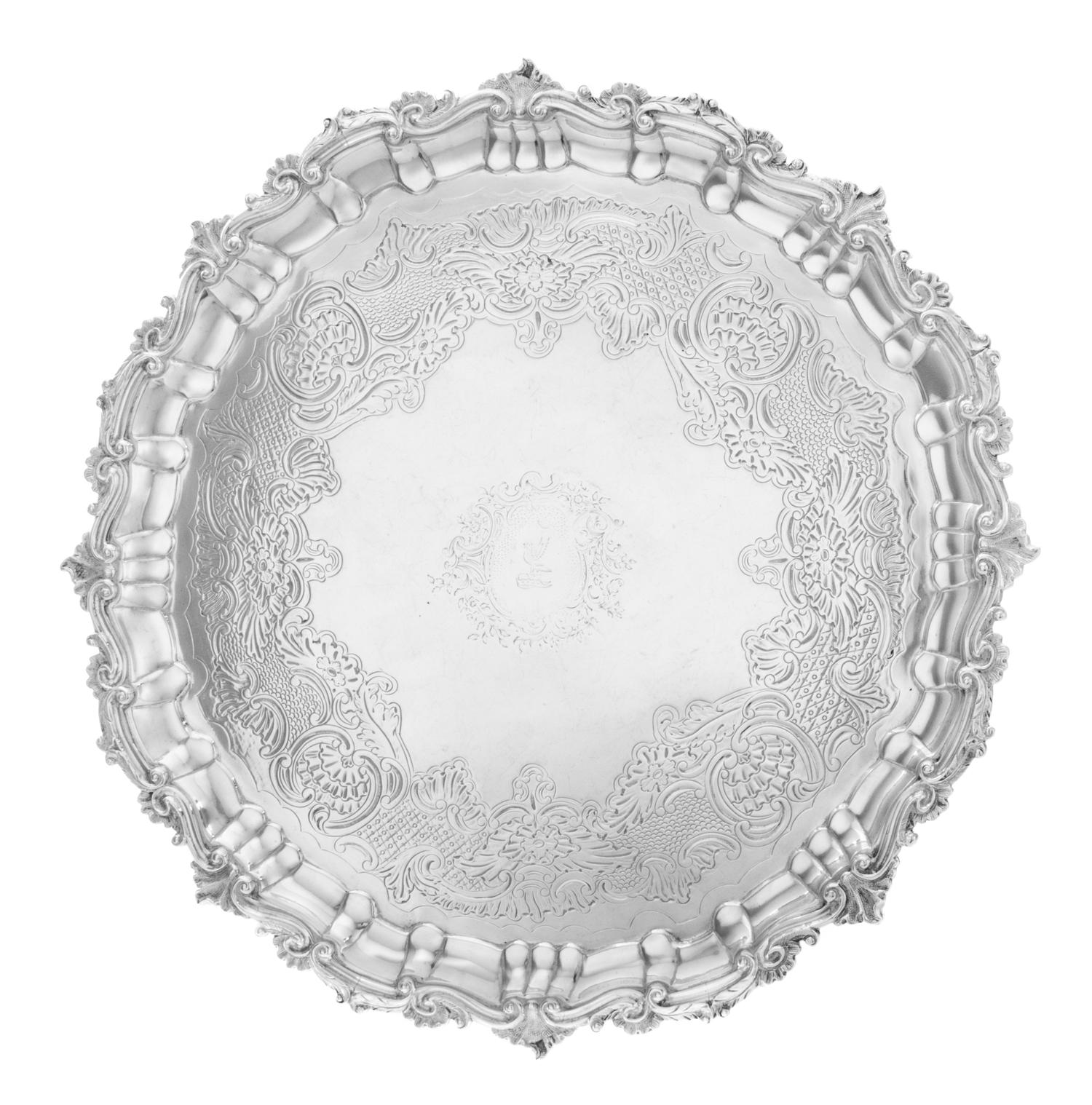 An Irish George III Silver Salver, Jas. Le Bass for Alderman West, Dublin, 1813, the undulating border worked to show rocaille, S-scrol