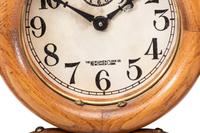 A Stick and Ball Oak Mantel Clock