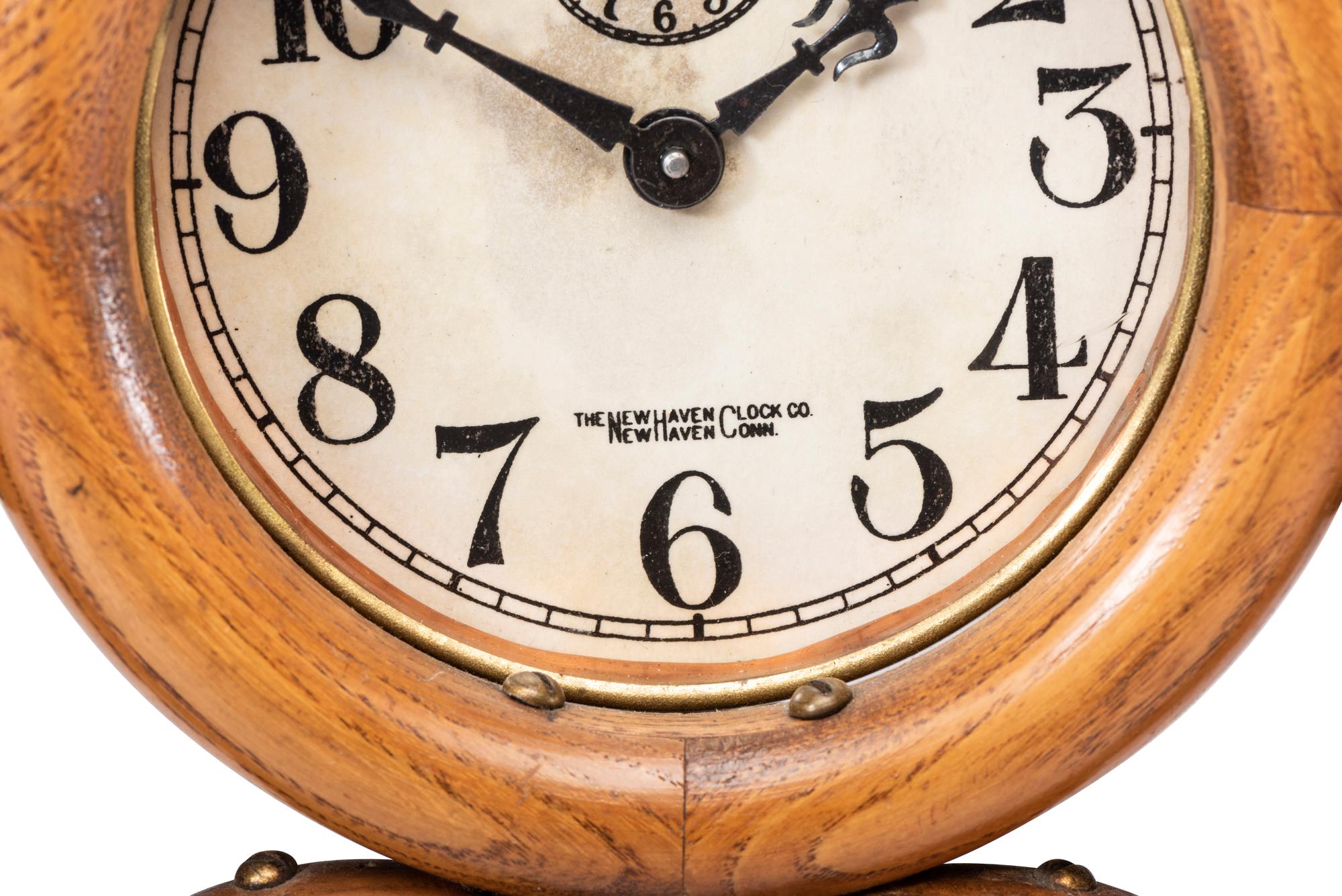 A Stick and Ball Oak Mantel Clock