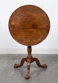 A George III Mahogany Tilt-Top Tea Table Height 26 1/2 x diameter of top 23 inches. — 19TH CENTURY