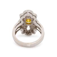 WHITE GOLD, TREATED YELLOW DIAMOND AND DIAMOND RING
