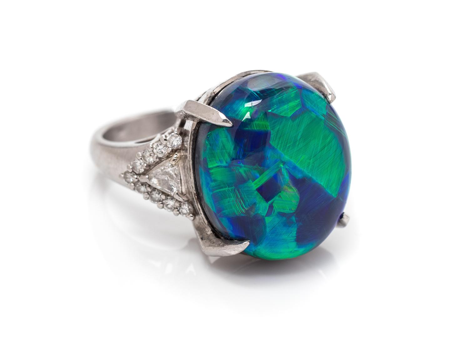 A Platinum, Diamond and Black Opal Ring,