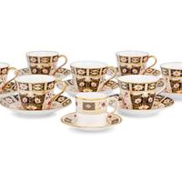 A Group of Royal Crown Derby Porcelain Teacups and Saucers