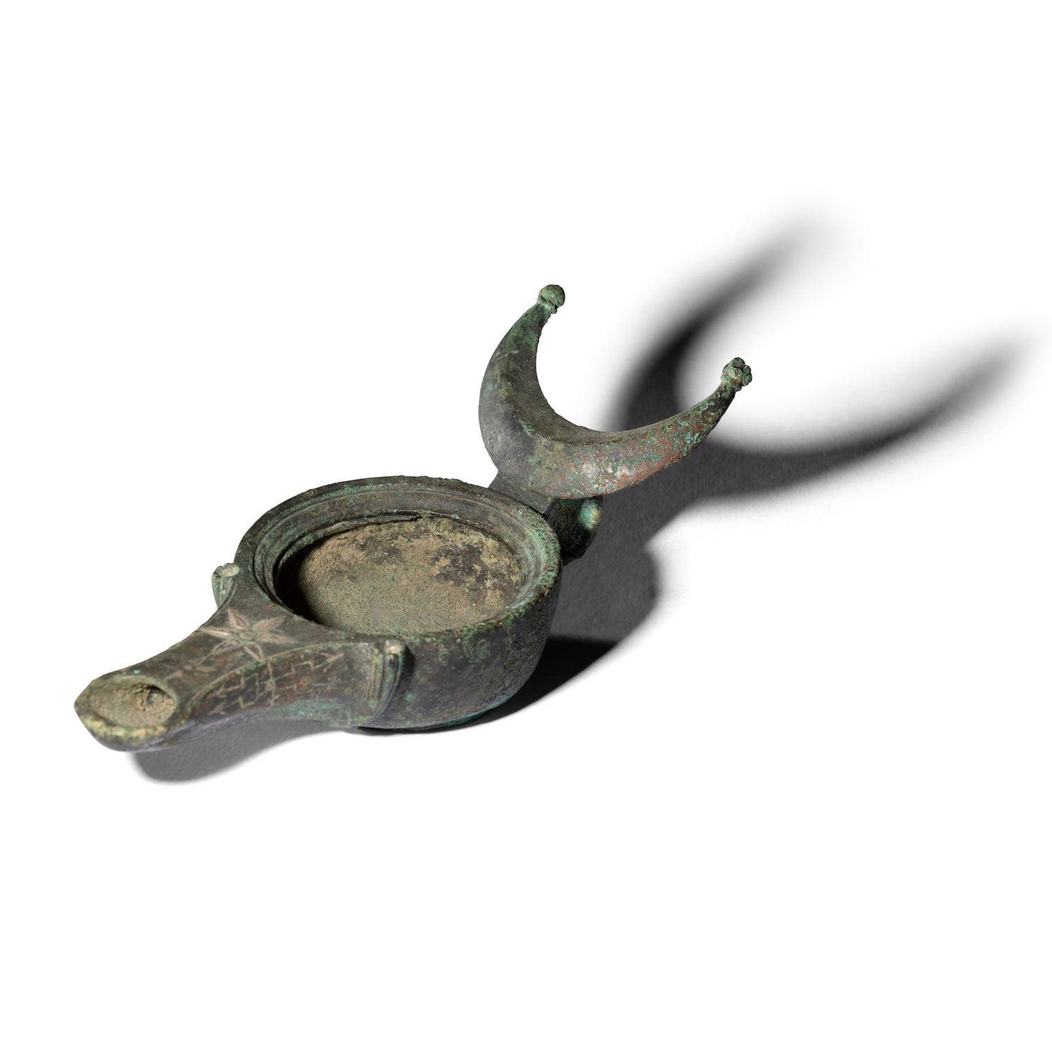 A Roman Bronze Oil Lamp