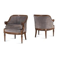 A Pair of Directoire Style Carved Walnut Tub Armchairs