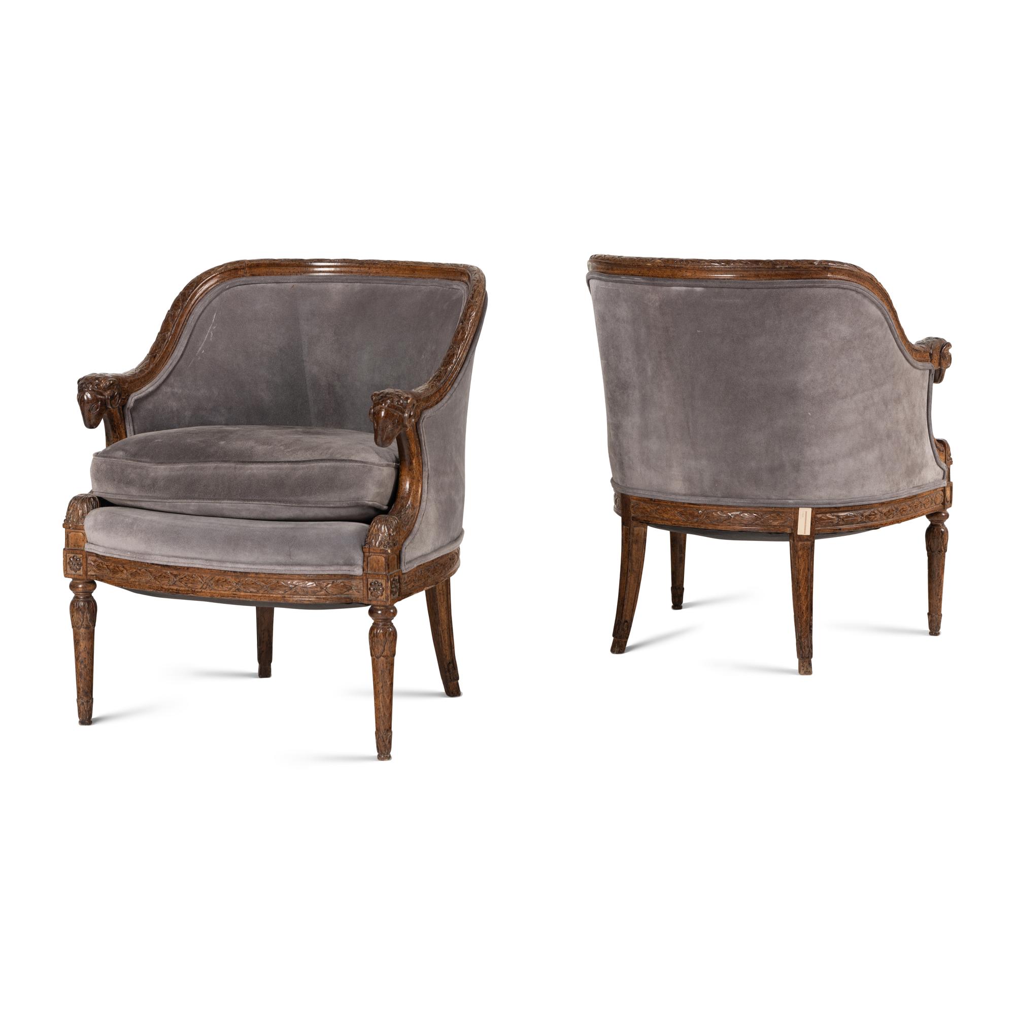 A Pair of Directoire Style Carved Walnut Tub Armchairs
