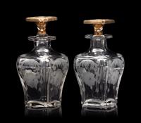 Two American 14-Karat Gold Mounted Cut Glass Toiletry Bottles
