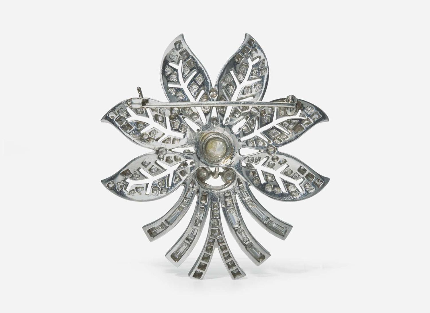 A Platinum and Diamond Flower Brooch