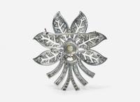 A Platinum and Diamond Flower Brooch