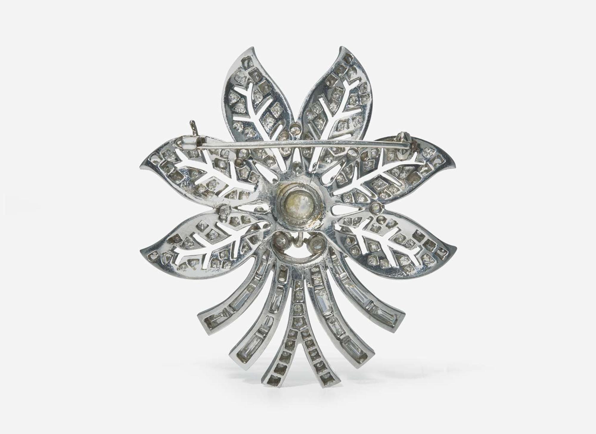 A Platinum and Diamond Flower Brooch