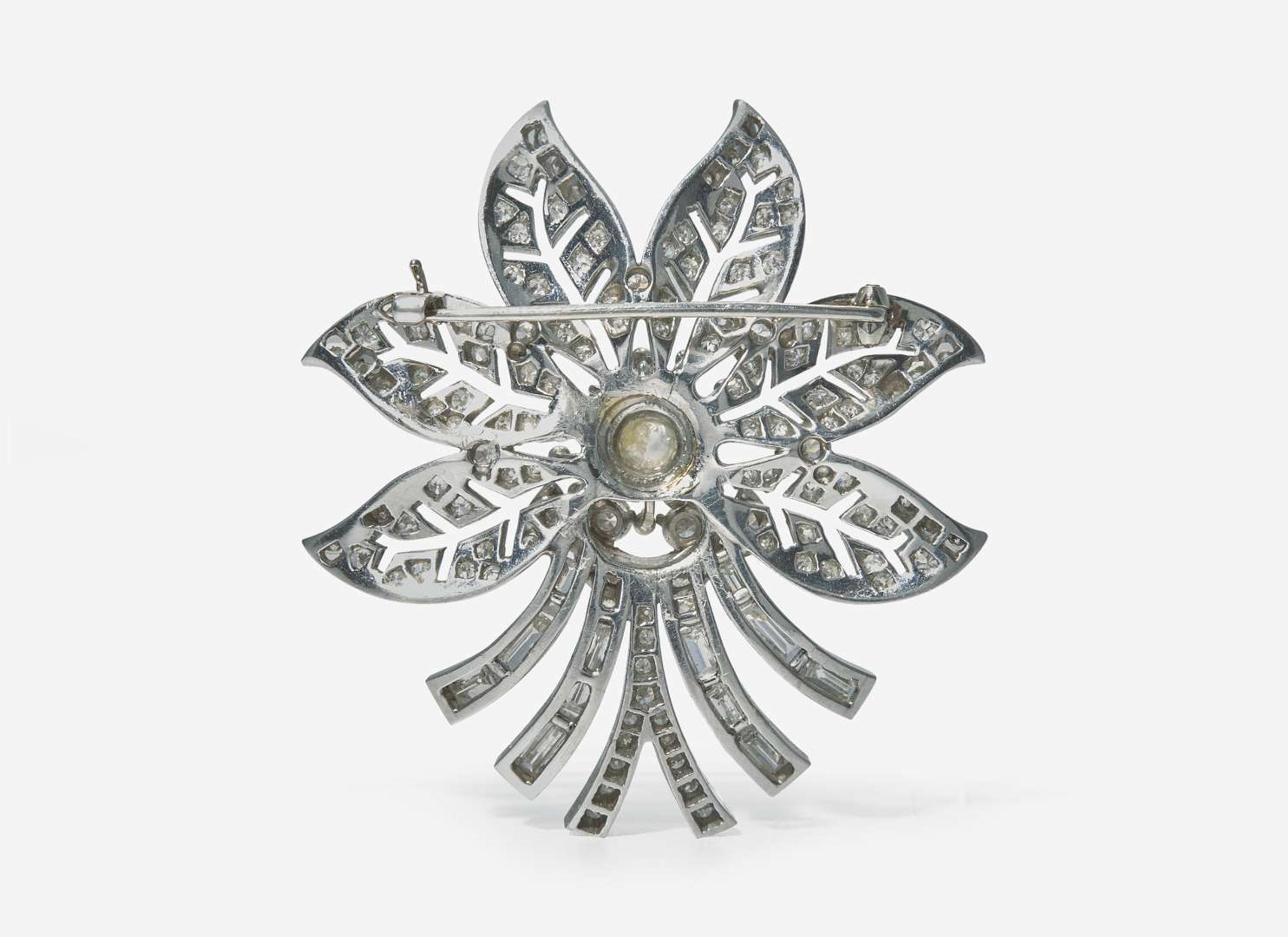A Platinum and Diamond Flower Brooch