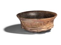 A Maya Terracotta Vessel with Glyphs