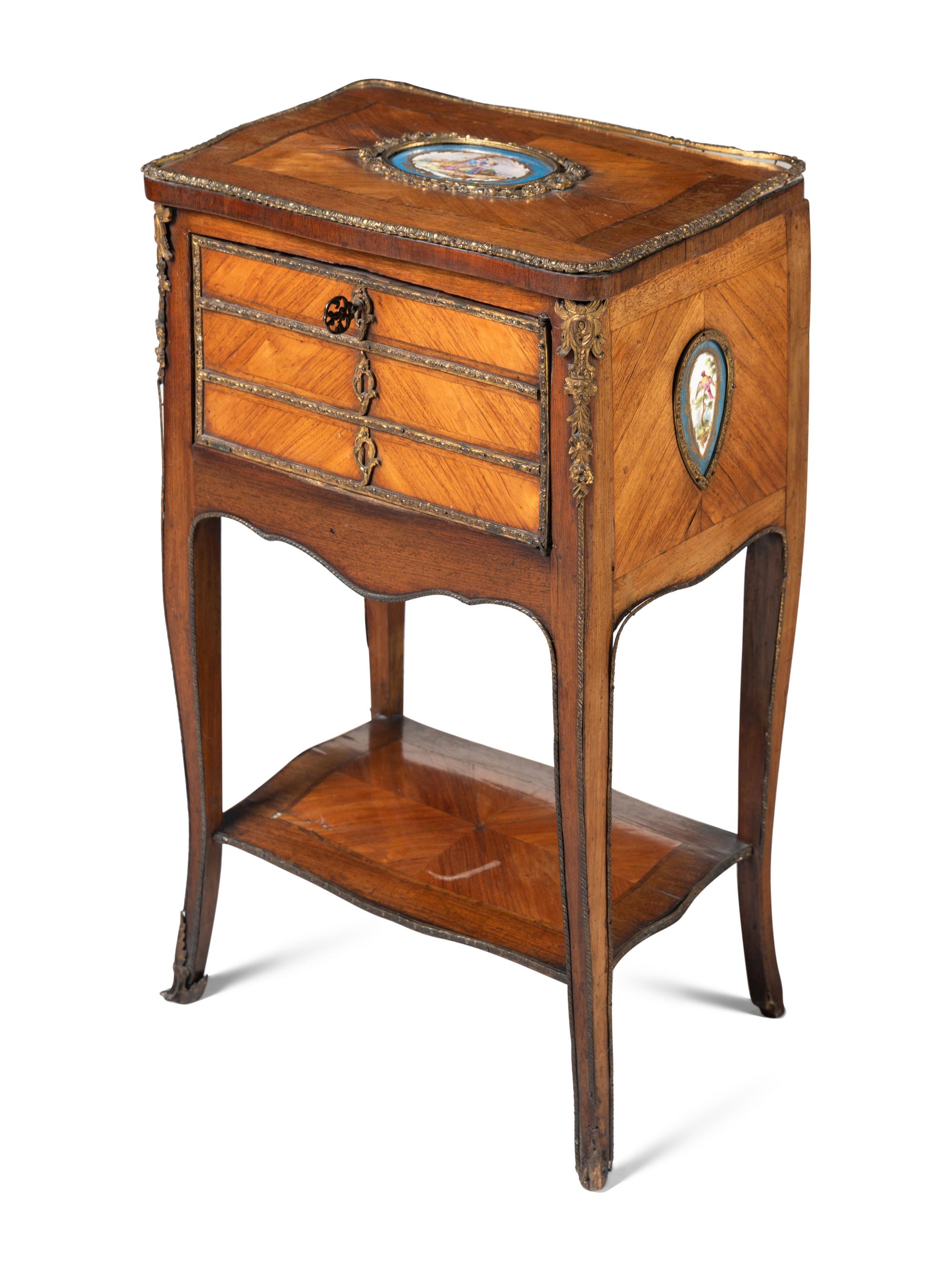 A Louis XV Style Chiffonier with Porcelain Inset Plaques