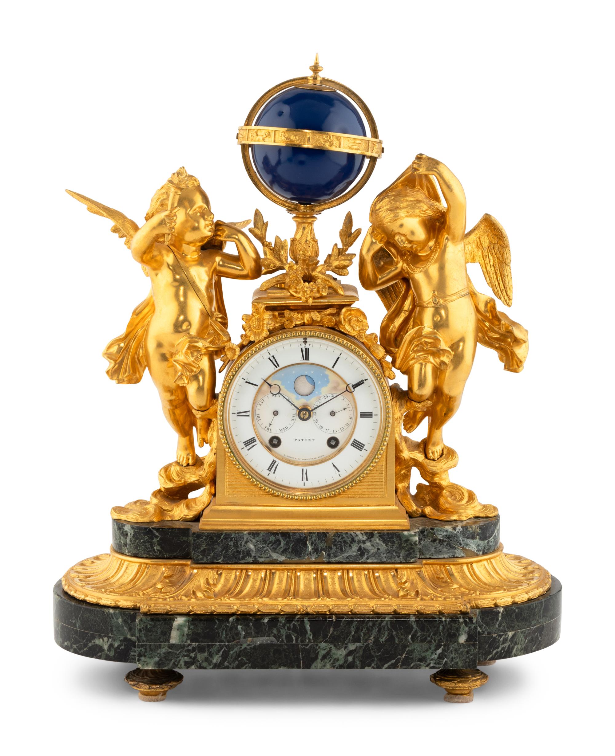 A Continental Gilt Bronze and Marble Figural Mantel Clock