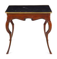 A French Gilt Metal Mounted Parcel Ebonized Mahogany Game Table