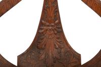 An Italian Carved Mahogany Gondola Chair with Swivel Seat