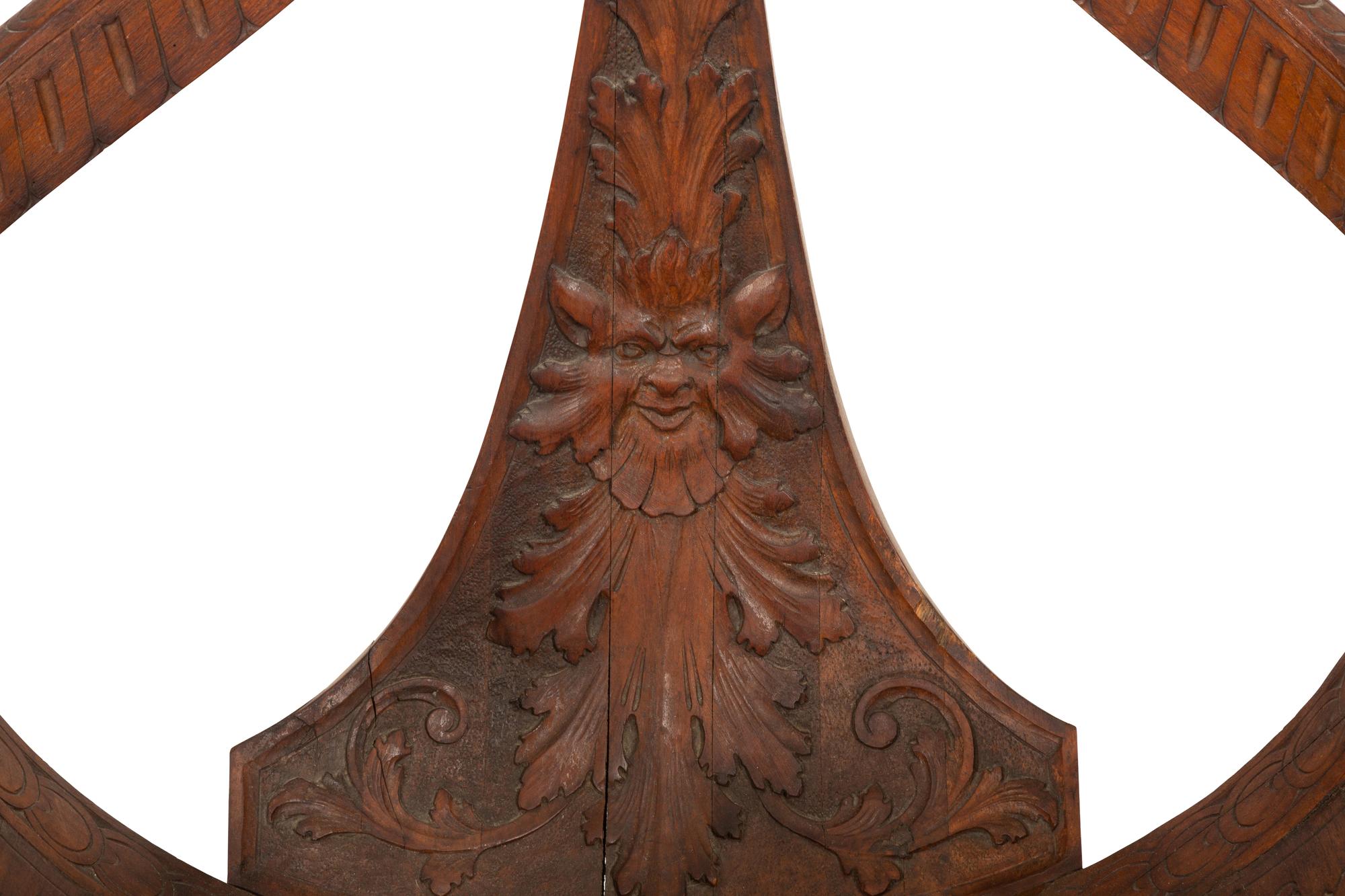 An Italian Carved Mahogany Gondola Chair with Swivel Seat