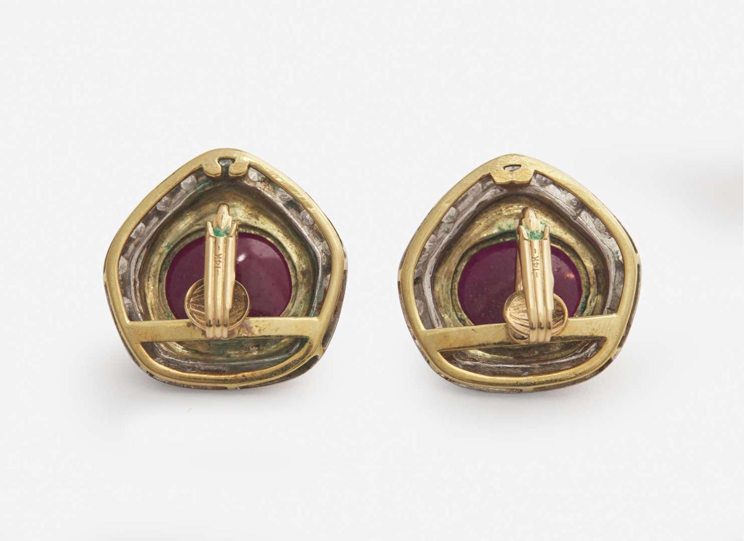 A Pair of Carved Ruby and Diamond Ear Clips