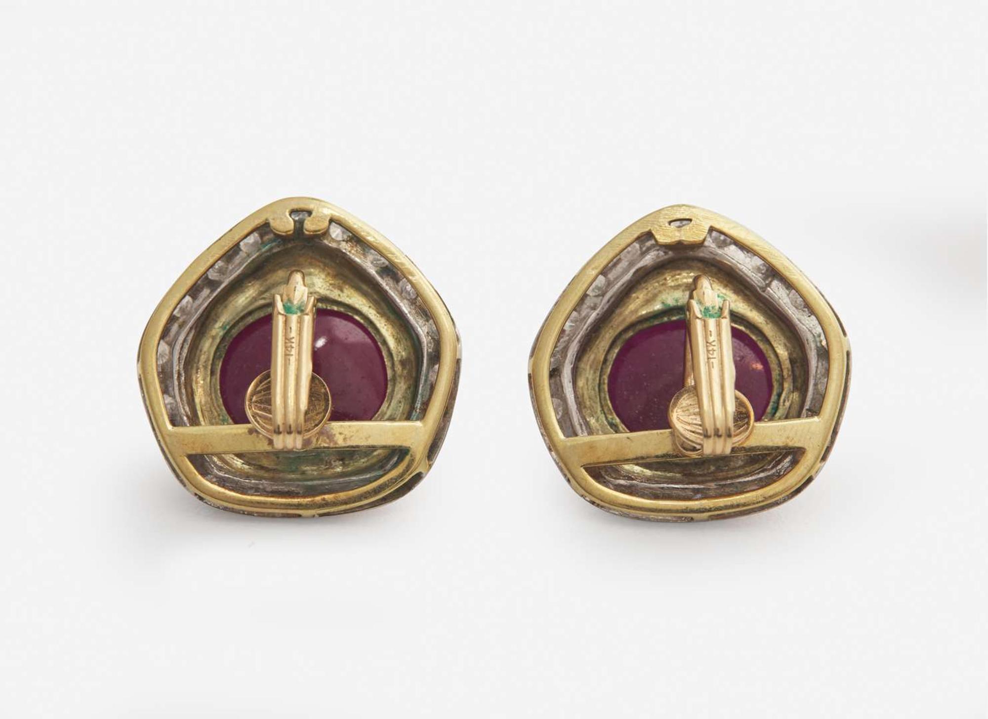A Pair of Carved Ruby and Diamond Ear Clips